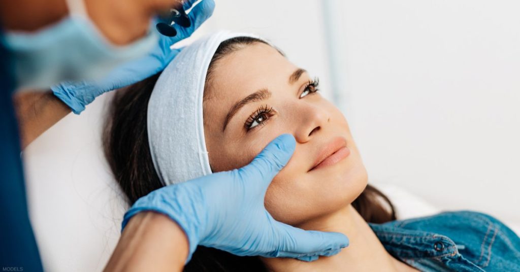 Woman receiving a BOTOX treatment (models)